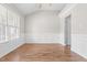 Bright and airy bedroom with hardwood floors, crown molding, and ample natural light at 1012 Trail Stream Way, Knightdale, NC 27545