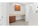 An office area with a built-in desk and cabinets at 104 Rosebud Ln, Durham, NC 27704