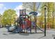 Community playground featuring slides and climbing areas for outdoor fun at 104 Rosebud Ln, Durham, NC 27704