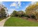 Green space with mature landscaping that features a well maintained lawn, walking path, and privacy at 10410 Sablewood Dr # 111, Raleigh, NC 27617