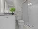 Clean, well-lit bathroom featuring a shower and a vanity with granite countertop at 10410 Sablewood Dr # 111, Raleigh, NC 27617
