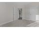 Large bedroom featuring an open doorway and plush carpeting at 10410 Sablewood Dr # 111, Raleigh, NC 27617