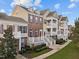 Attractive townhome exteriors featuring private balconies, brick accents, and manicured landscaping for curb appeal at 10410 Sablewood Dr # 111, Raleigh, NC 27617
