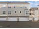 Attached garages with exterior features of a townhome community for convenient parking and access at 10410 Sablewood Dr # 111, Raleigh, NC 27617