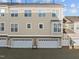 Attached garages with exterior features of a townhome community for convenient parking and access at 10410 Sablewood Dr # 111, Raleigh, NC 27617