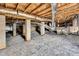Spacious unfinished basement with visible ductwork and concrete block support columns at 105 Scoville Rd, Garner, NC 27529