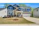 Charming two-story home featuring stone accents, neutral siding and a two car attached garage at 105 Scoville Rd, Garner, NC 27529