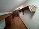 Attic with built-in shelving, offering ample storage options at 106 Orchard Rd, Henderson, NC 27536