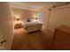 Cozy bedroom with carpet and ample natural light at 106 Orchard Rd, Henderson, NC 27536