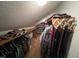 Walk-in closet with built-in shelves and ample hanging space for organized storage at 106 Orchard Rd, Henderson, NC 27536