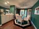 Spacious dining room features a glass table and seating for six at 106 Orchard Rd, Henderson, NC 27536