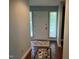 Bright entrance featuring front door between two large windows at 106 Orchard Rd, Henderson, NC 27536