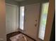 Interior entrance featuring a door and adjacent windows, plus a closet at 106 Orchard Rd, Henderson, NC 27536