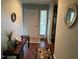 Welcoming entryway with unique decor and textured floors at 106 Orchard Rd, Henderson, NC 27536
