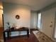 Inviting entryway featuring a decorative table and access to multiple rooms at 106 Orchard Rd, Henderson, NC 27536