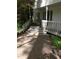 Exterior view of the front porch and entrance of a white-painted home at 106 Orchard Rd, Henderson, NC 27536
