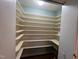 Spacious pantry offering ample shelving for organized storage and easy access to goods at 106 Orchard Rd, Henderson, NC 27536