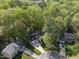 Aerial view of the home nestled among lush trees in a well-established neighborhood at 108 Ridgepath Way, Cary, NC 27511