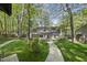 Spacious backyard featuring a lush lawn and a stone pathway at 108 Ridgepath Way, Cary, NC 27511