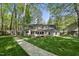 Spacious backyard with a lush green lawn at 108 Ridgepath Way, Cary, NC 27511