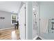 Bathroom featuring a tiled shower with a glass door at 108 Ridgepath Way, Cary, NC 27511