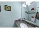 This bathroom features a granite countertop, framed mirror, and toilet at 108 Ridgepath Way, Cary, NC 27511