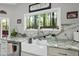 Kitchen sink with granite counters and view of landscaped backyard at 108 Ridgepath Way, Cary, NC 27511