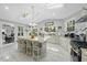 Bright kitchen with skylights, a large island, and modern appliances at 108 Ridgepath Way, Cary, NC 27511