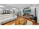 Another angle of the living room shows a brick fireplace and entertainment center at 108 Ridgepath Way, Cary, NC 27511