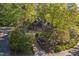 Beautiful brick home with a two-car garage surrounded by mature trees at 108 Sierra Dr, Chapel Hill, NC 27514