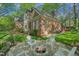Beautiful backyard featuring a fire pit surrounded by Adirondack chairs, perfect for outdoor entertaining at 108 Sierra Dr, Chapel Hill, NC 27514