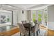 Charming dining room featuring a bay window, wood floors and classic décor at 108 Sierra Dr, Chapel Hill, NC 27514