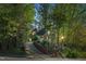 Stately brick home featuring well-maintained landscaping and a private driveway at 108 Sierra Dr, Chapel Hill, NC 27514