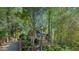 Charming brick home with lush greenery and a welcoming driveway at 108 Sierra Dr, Chapel Hill, NC 27514