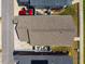 Birds eye view of roof, yard with patio set and car parked in driveway showcase the property layout and outdoor space at 110 Plott Hound Dr, Clayton, NC 27520