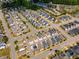 Expansive aerial view of a well-planned residential community with lush landscaping, parks and community amenities at 110 Plott Hound Dr, Clayton, NC 27520