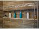 Close up of shower shelf containing an assortment of bathing and hair products at 110 Plott Hound Dr, Clayton, NC 27520