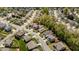 Overhead shot of a residential neighborhood features well-maintained homes, sidewalks, and landscaped yards at 112 Pink Dogwood Ln, Mebane, NC 27302