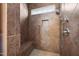 Bathroom features a walk-in shower with tiled walls and built-in seat at 112 Pink Dogwood Ln, Mebane, NC 27302