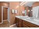 Bathroom boasts double vanity and access to walk-in shower at 112 Pink Dogwood Ln, Mebane, NC 27302