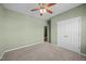 Bedroom with neutral carpet, ceiling fan and closet at 112 Pink Dogwood Ln, Mebane, NC 27302