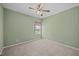 Bedroom with neutral carpet, ceiling fan and bright window at 112 Pink Dogwood Ln, Mebane, NC 27302