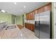 Well-lit kitchen features stainless steel appliances and granite countertops at 112 Pink Dogwood Ln, Mebane, NC 27302