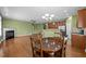 Open floor plan displays a dining area leading into a spacious living room at 112 Pink Dogwood Ln, Mebane, NC 27302