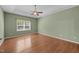 Large bedroom with tray ceilings and great natural light from the window at 112 Pink Dogwood Ln, Mebane, NC 27302