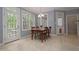 Eat-in area with plenty of natural light, access to back deck at 1120 Scholastic Cir, Durham, NC 27713