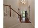 Inviting entryway features a staircase, hardwood floors and lots of natural light at 1120 Scholastic Cir, Durham, NC 27713