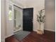 Welcoming entryway with a stylish black door and a glimpse of the inviting interior at 1120 Scholastic Cir, Durham, NC 27713