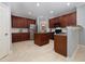 Open concept kitchen with stainless steel appliances and lots of cabinet space at 1120 Scholastic Cir, Durham, NC 27713