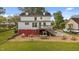 Spacious backyard with a patio, outdoor seating, and play area under the deck for  at 116 W Front St, Oxford, NC 27565